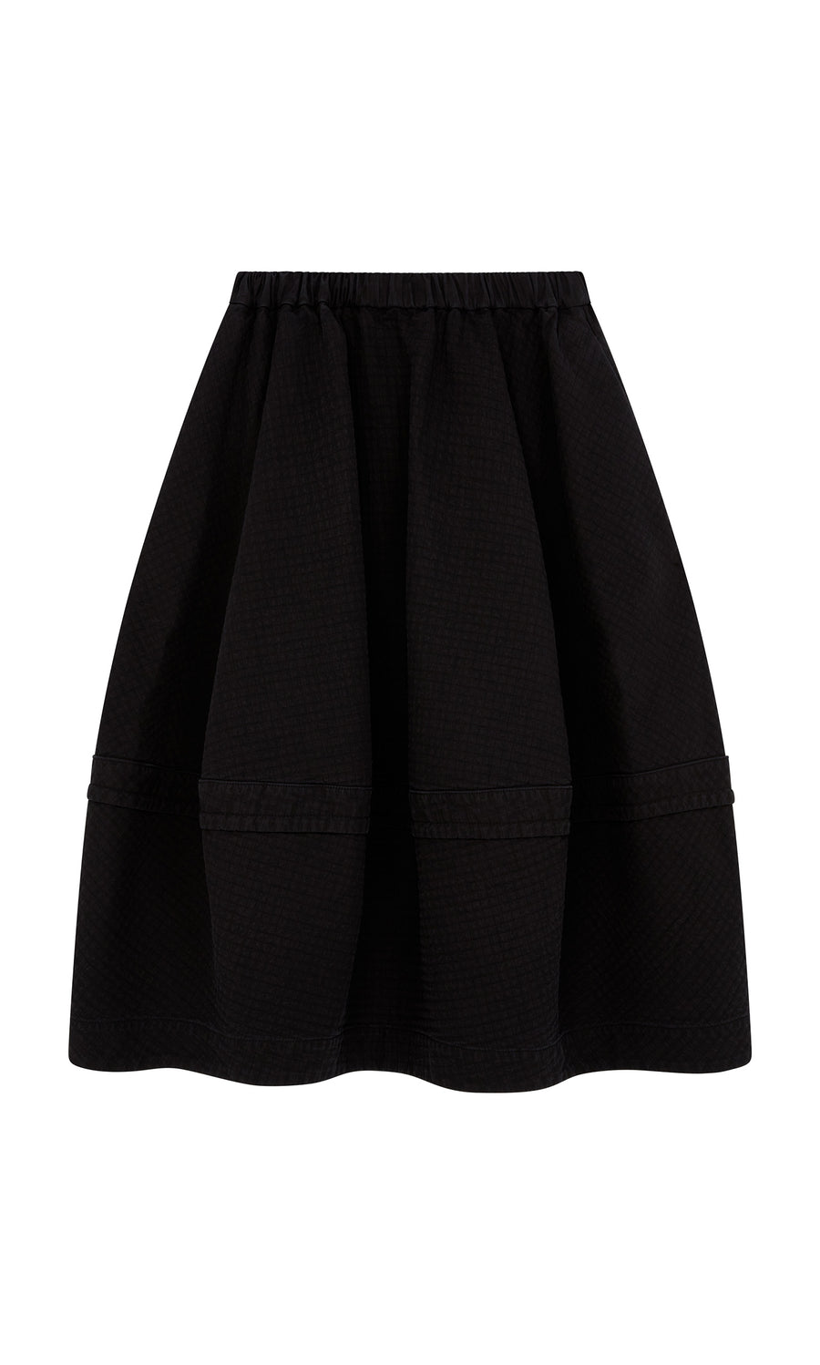 Plümo  Rho Skirt - Coal: Black quilted skirt with flared silhouette and elastic waistband for effortless, stylish comfort.