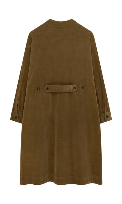 Plümo  Frances Dress in brown cotton corduroy, made in England, with long sleeves, back strap, and button details—back view.