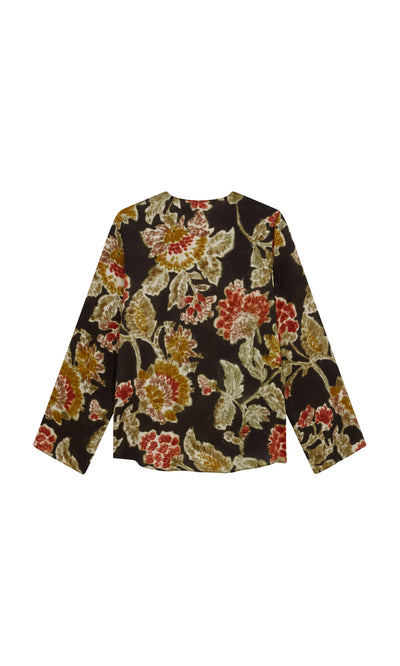 Plümo  Tokley Blouse: Long-sleeve, dark background, blurry red, yellow  green floral design by Plümo Studio.