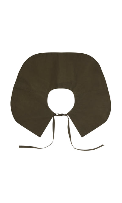 Plümo- Cape Collar in dark brown waxed cotton with a circular neck and two long front ties; a chic layering accessory.
