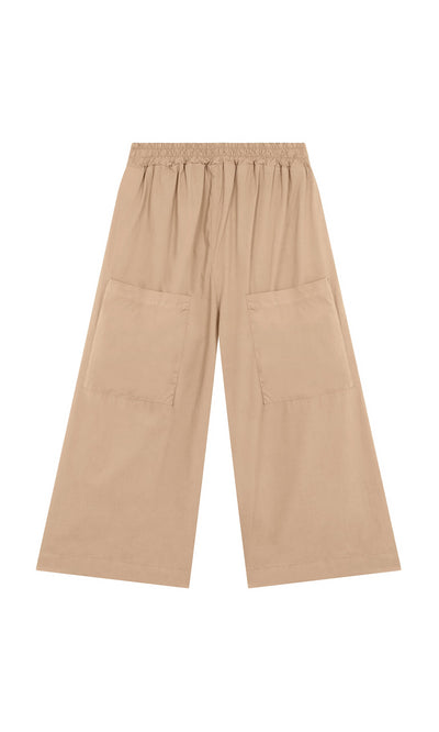 Plümo- Howland Pants: light brown cotton, wide-leg pull-on style with large patch pockets and elastic waist, on white background.