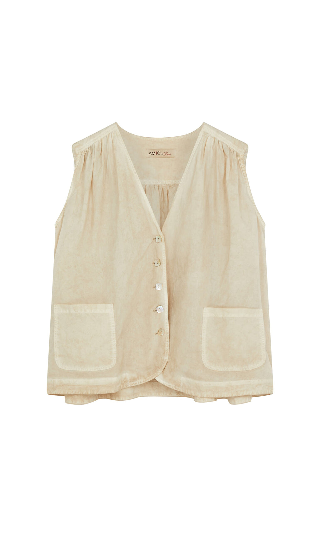 Plümo- Cayte Waistcoat: sleeveless beige cotton with shell buttons and two large front pockets, shown on a plain background.