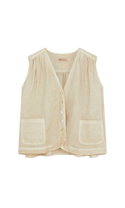Plümo- Cayte Waistcoat: sleeveless beige cotton with shell buttons and two large front pockets, shown on a plain background.