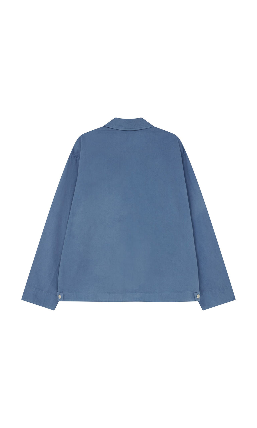 Plümo- Back view of the Flanders Jacket - French Blue, a cotton canvas workwear piece with collar and buttoned cuffs, made in London.