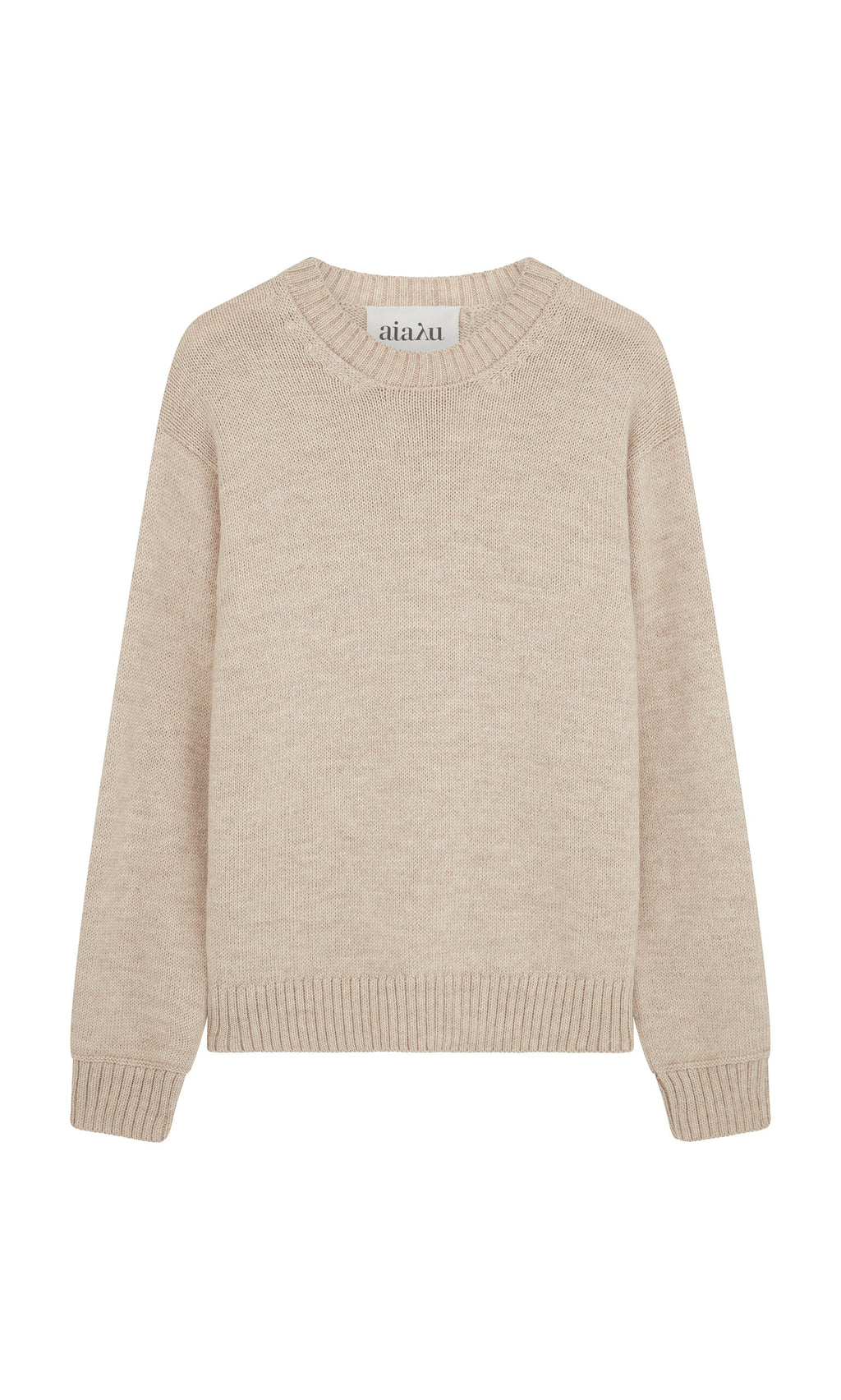 Plümo- Christie Wool Jumper in beige Highland wool with long sleeves, ribbed cuffs, hem, and neckline, laid flat on white.