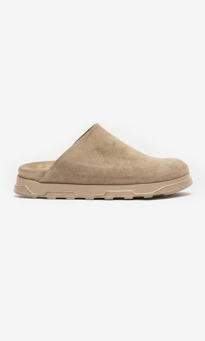 Plümo- Como Mules in tan taupe suede, handmade by Lofina, feature a comfy moulded footbed; shown in side profile.