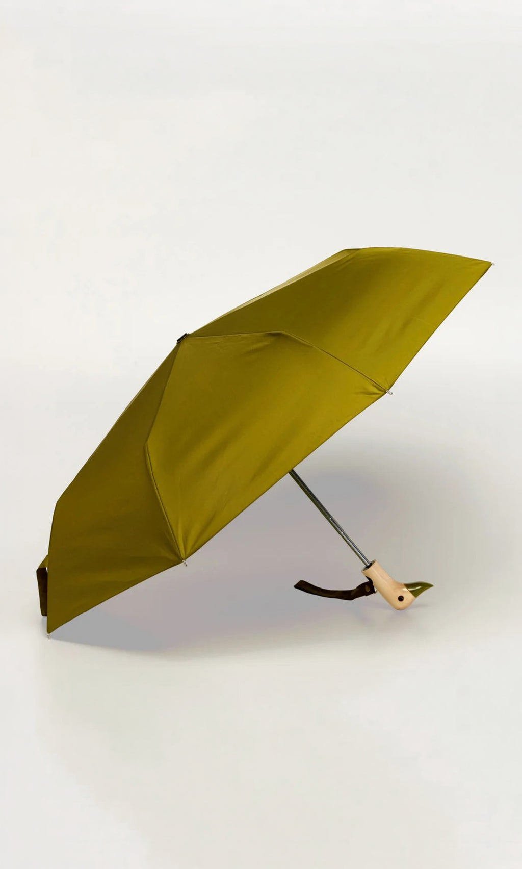 Plümo  Duck Umbrella - Olive: partially opened with wooden handle, black strap, on a plain white background.
