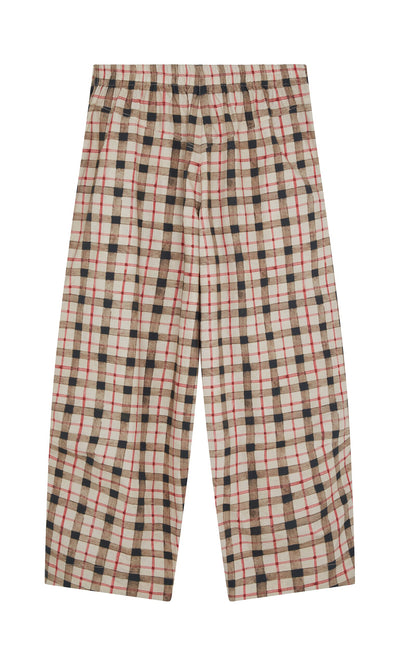 Plümo- Dundee Barrel Pants in a beige, red, and black plaid print, wide-leg and high waist, laid flat on white background.