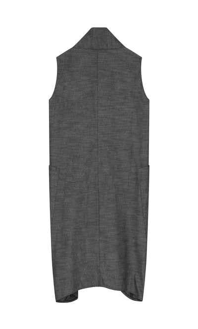 Plümo- The Emi Dress is a sleeveless graphite denim vest with a long, straight cut and two side pockets, shown from the back.
