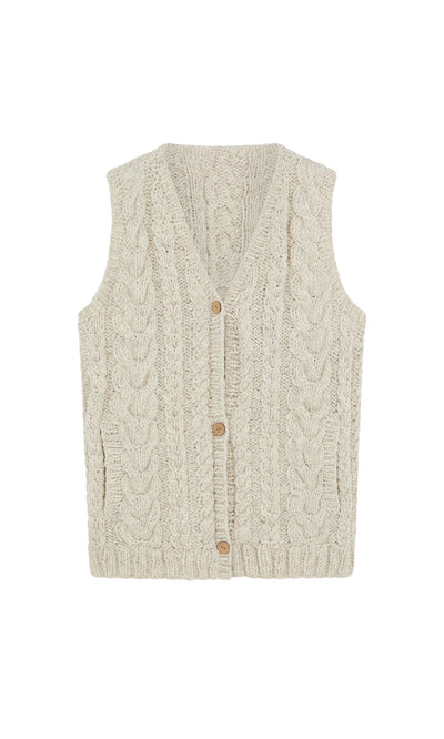 Plümo- The Finstock Waistcoat is a cream Fairtrade, handknitted cable-knit vest with a V-neck and three wooden buttons.