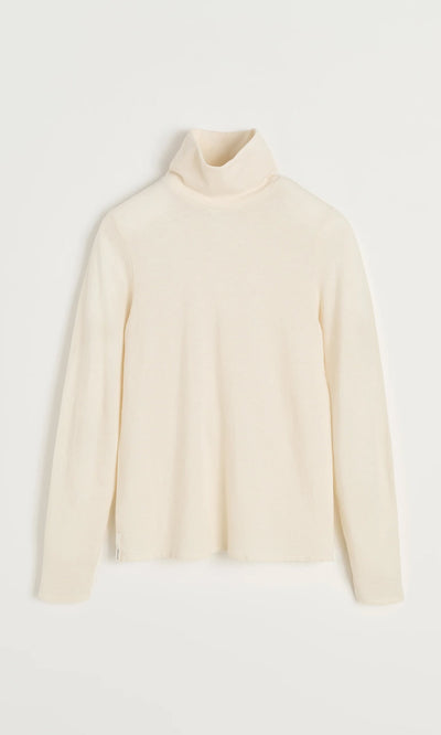 Plümo- Gentle Turtleneck in cream cotton and cashmere laid flat on a white background.