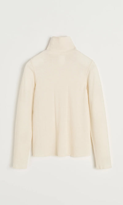 Plümo- Back view of the cream Gentle Turtleneck, a cotton and cashmere sweater, shown against a plain white background.