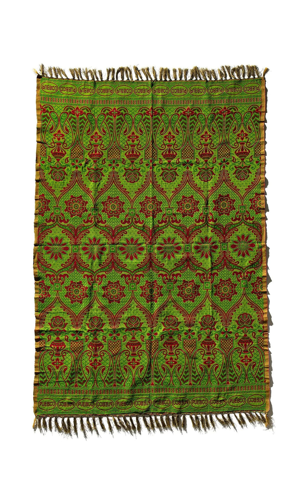Plümo- Green Jacquard Rug with red floral and geometric patterns, finished with fringed edges.