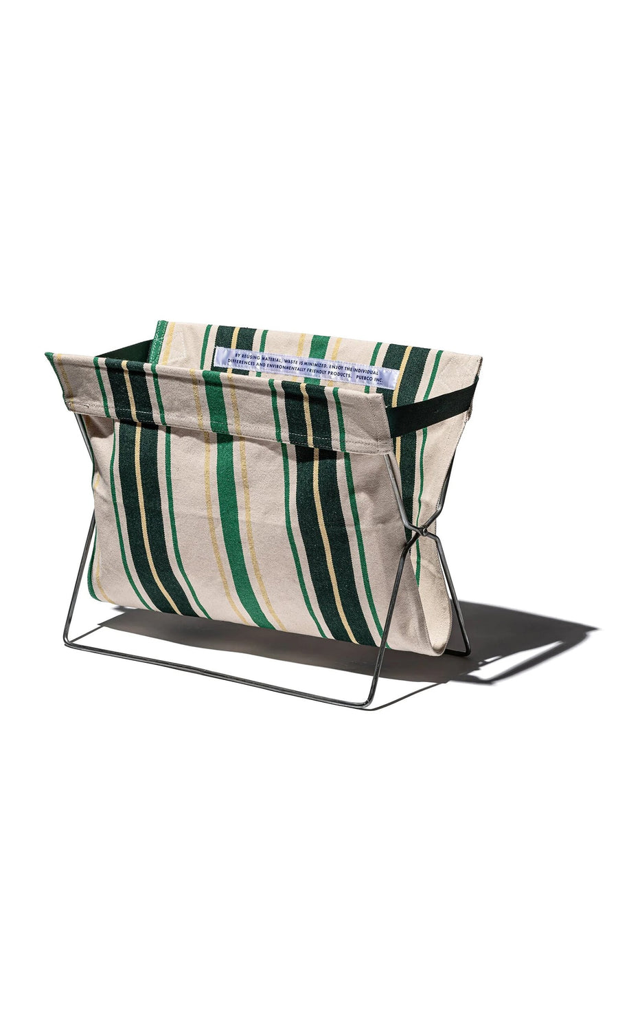 Plümo- The Green Stripe Folding Bag with a steel frame neatly holds magazines on a white background.