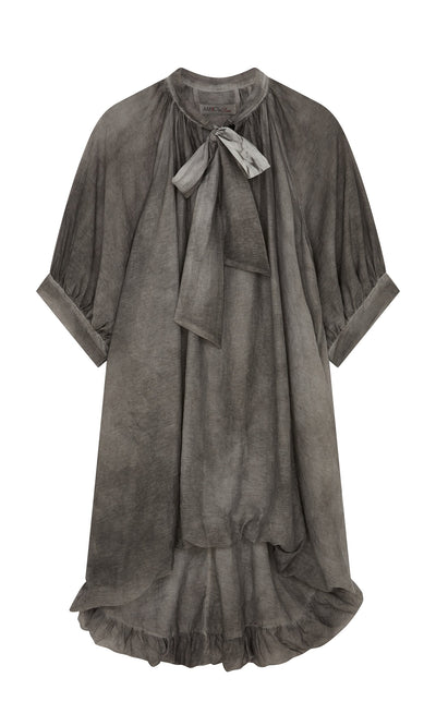 Plümo- A loose, gray voile blouse with short sleeves and a pussy-bow necktie at the neckline.