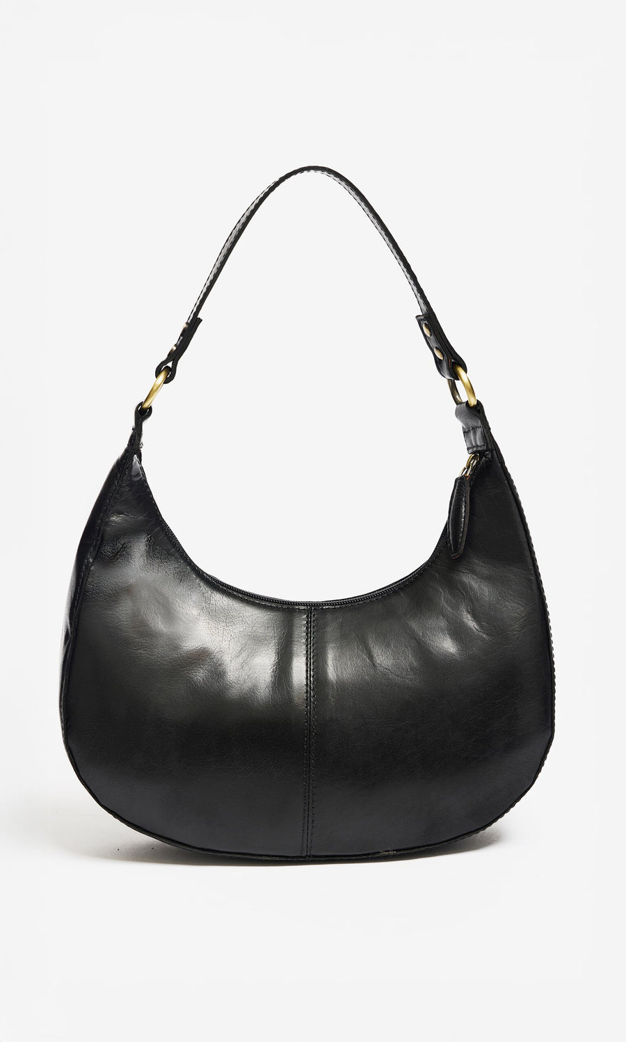 Plümo- The Hadlow Bag is a polished leather crescent with a single strap, worn as a sleek shoulder or crossbody handbag.
