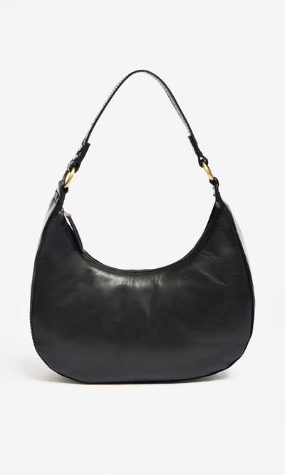 Plümo- Hadlow Bag: black crescent-shaped polished leather, short shoulder strap, gold-tone hardware, on white background.