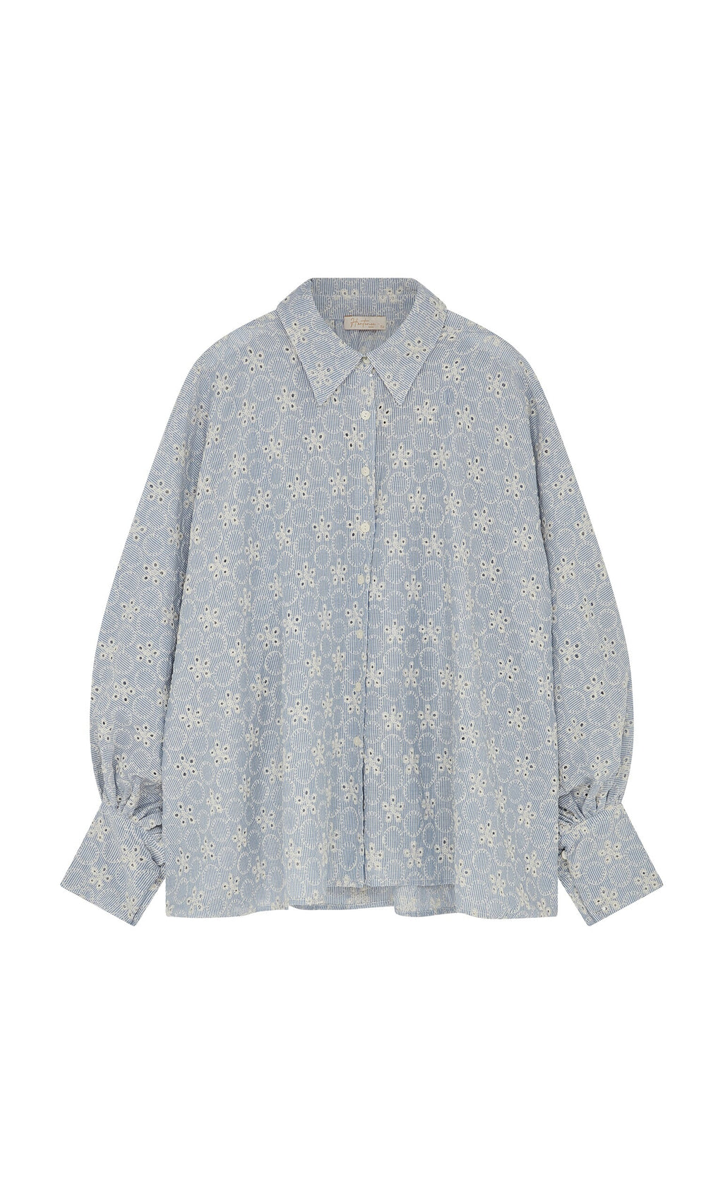Plümo- The Hortence Blouse is a light blue broderie anglaise shirt with balloon sleeves, collar, and button closures.