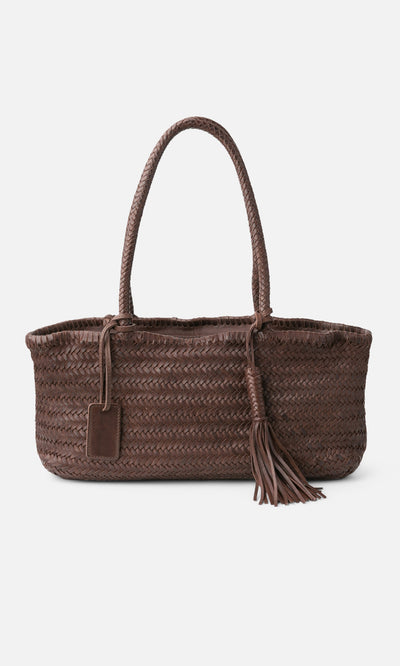 Plümo- Inga Plait Bag: dark brown braided cowhide leather, two handles, tassel, and tag on a white background.