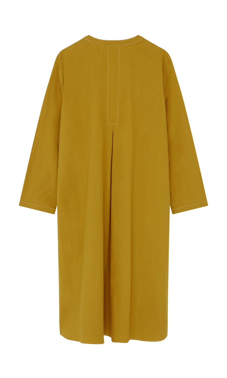 Plümo- Back view of loose-fitting, long-sleeved Kaftan Dress in mustard with center pleat, made in London.