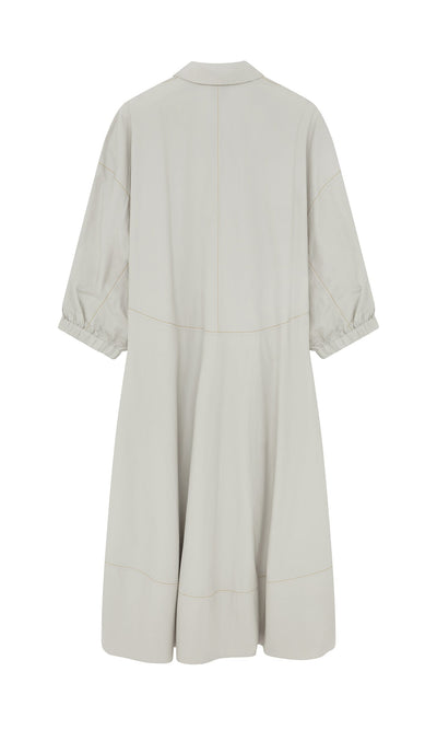 Plümo- Back view of the Kaisa Dress in light gray cotton poplin with collar, balloon sleeves, and a loose, flowing fit.