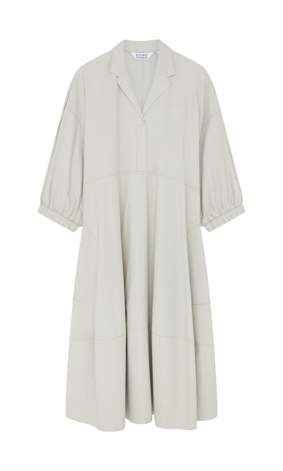 Plümo- The Kaisa Dress is a light grey cotton poplin dress with collar and balloon sleeves, made in England.