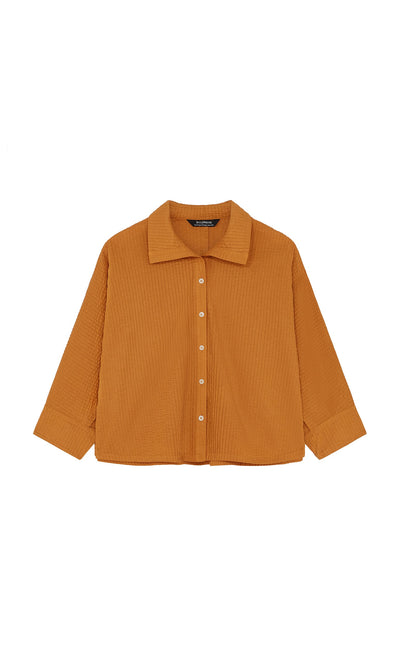 Plümo- The Karashi Shirt is a loose, long-sleeve Japanese top in mustard yellow with pintucks and a wide collar.