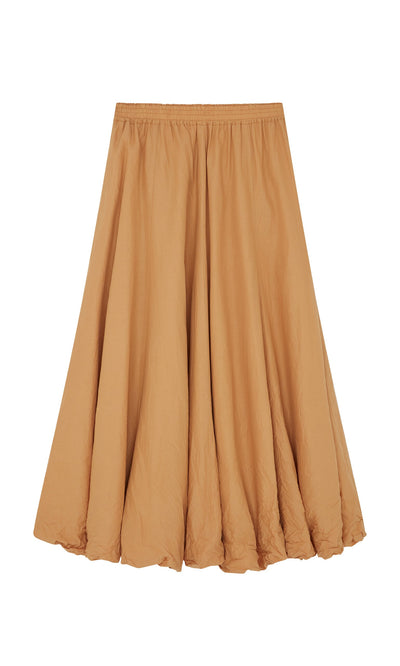 Plümo- The Kerze Skirt: a handmade, knee-length beige cotton skirt with an elastic waist, shown on a white background.