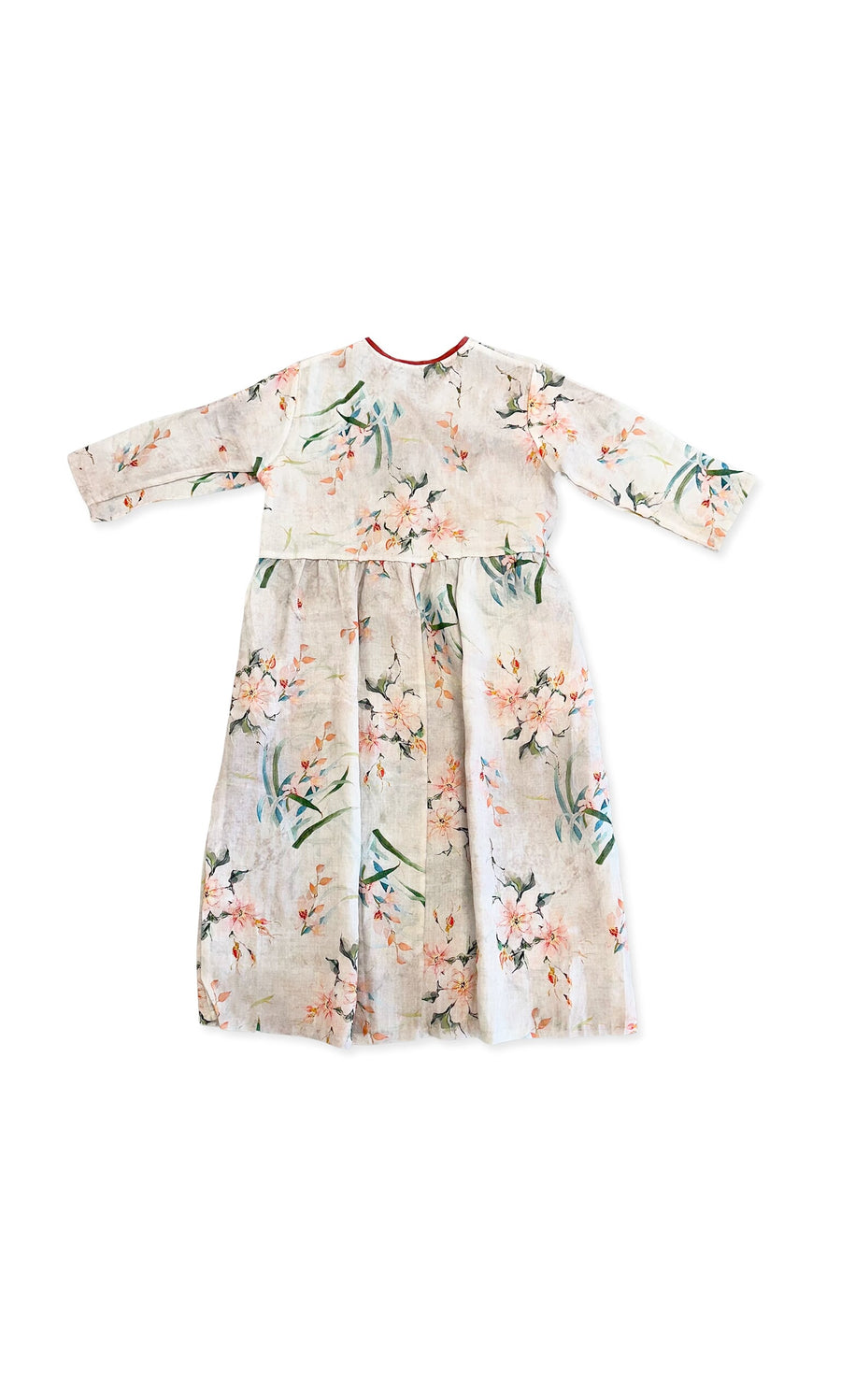Plümo- The Lian Flower Dress is a long-sleeved, cream tie-waist dress with pink, green, and orange floral print.