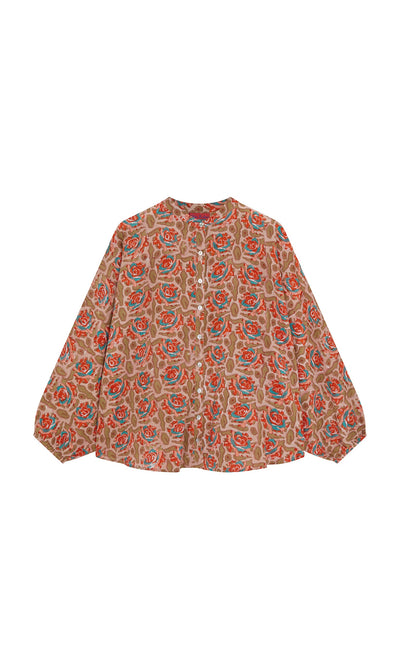 Plümo- The Lotus Flower Blouse is an ethical, loose cotton top with red and green floral block prints on beige.