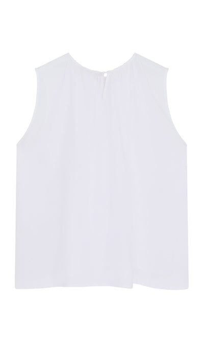 Plümo- The Marie Top - White is a sleeveless shell top with a round neckline, side slits, and back button detail.
