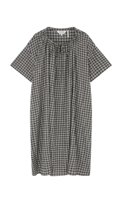Plümo- The Marin Dress - Plaid is a loose-fit, short-sleeve dress from London with a gathered neckline and front tie.