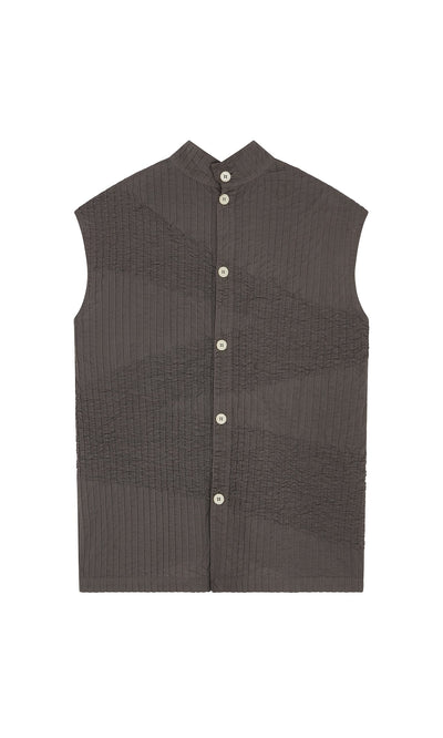 Plümo- Charcoal gray Minato Top: sleeveless tunic with mandarin collar, vertical pintucks, and white buttons.