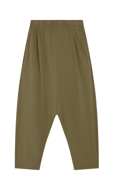 Plümo- Mirana Pants: Loose olive green jersey with Danish design, elastic waist, and dropped crotch, laid flat on white.