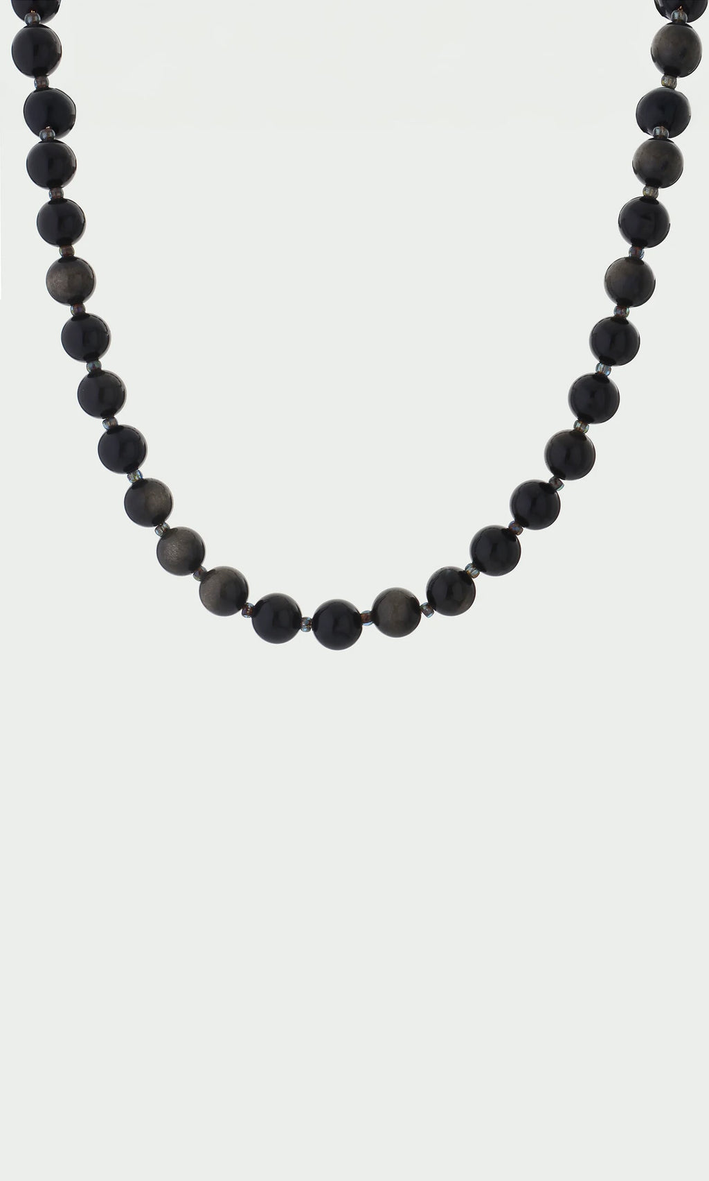 Plümo- The Olena Necklace features round, glossy black golden obsidian beads in a single strand on a white background.