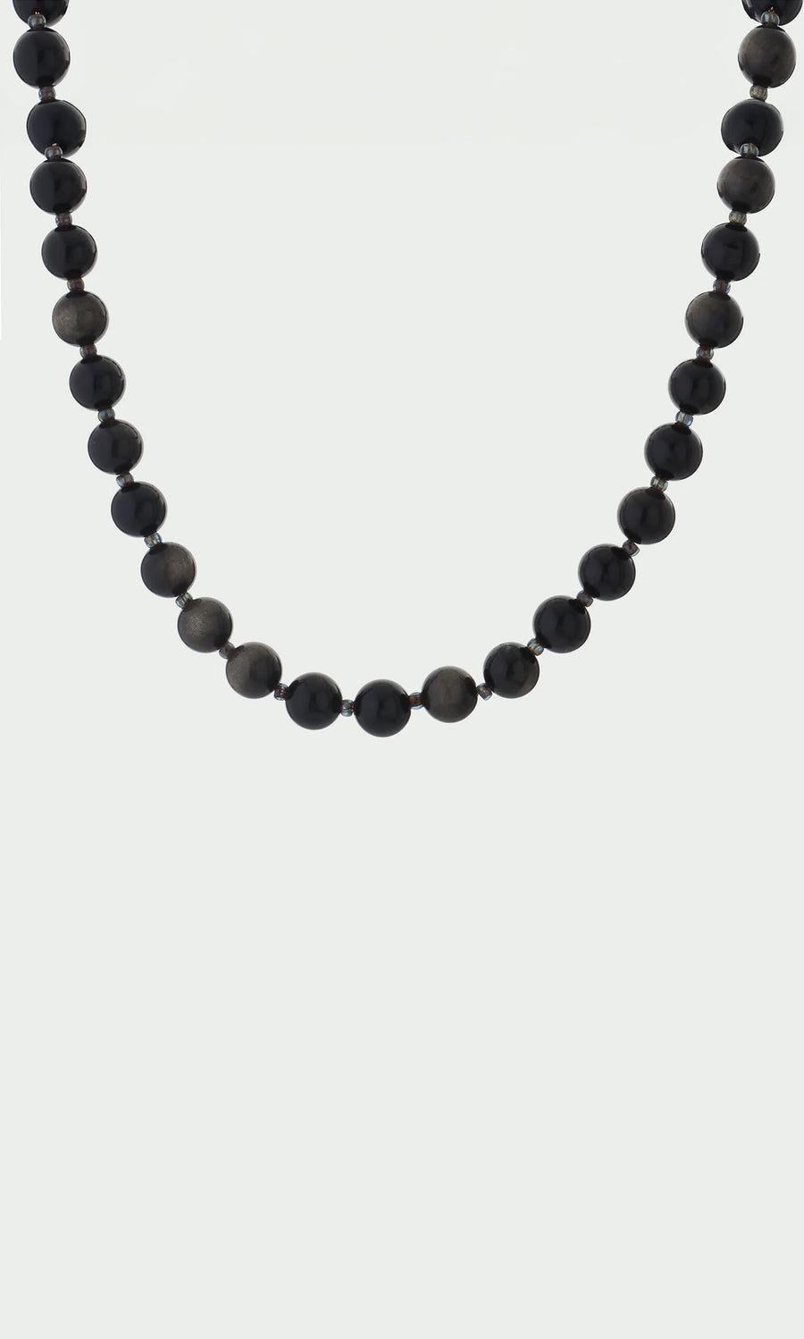 Plümo- The Olena Necklace features round, glossy black golden obsidian beads in a single strand on a white background.