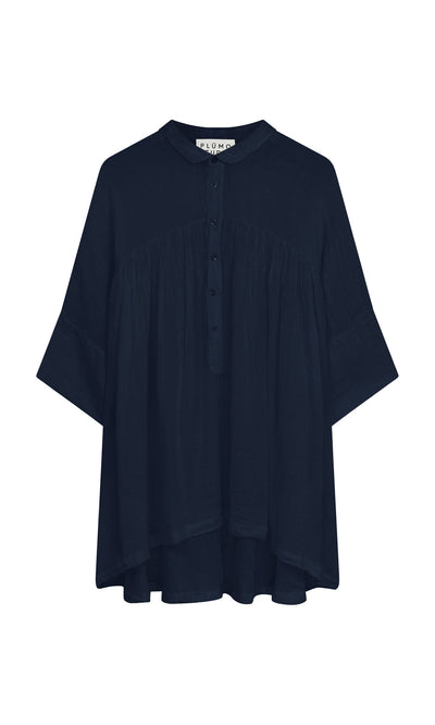 Plümo- The Thistle Blouse in Deep Navy features a loose fit, button placket, cropped sleeves, and a gathered yoke.