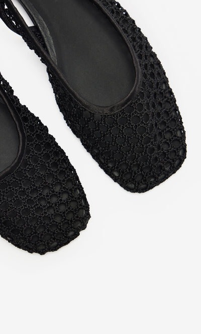 Plümo- Close-up of two black Noa Slingbacks with square toes and mesh design, displayed on a white background.