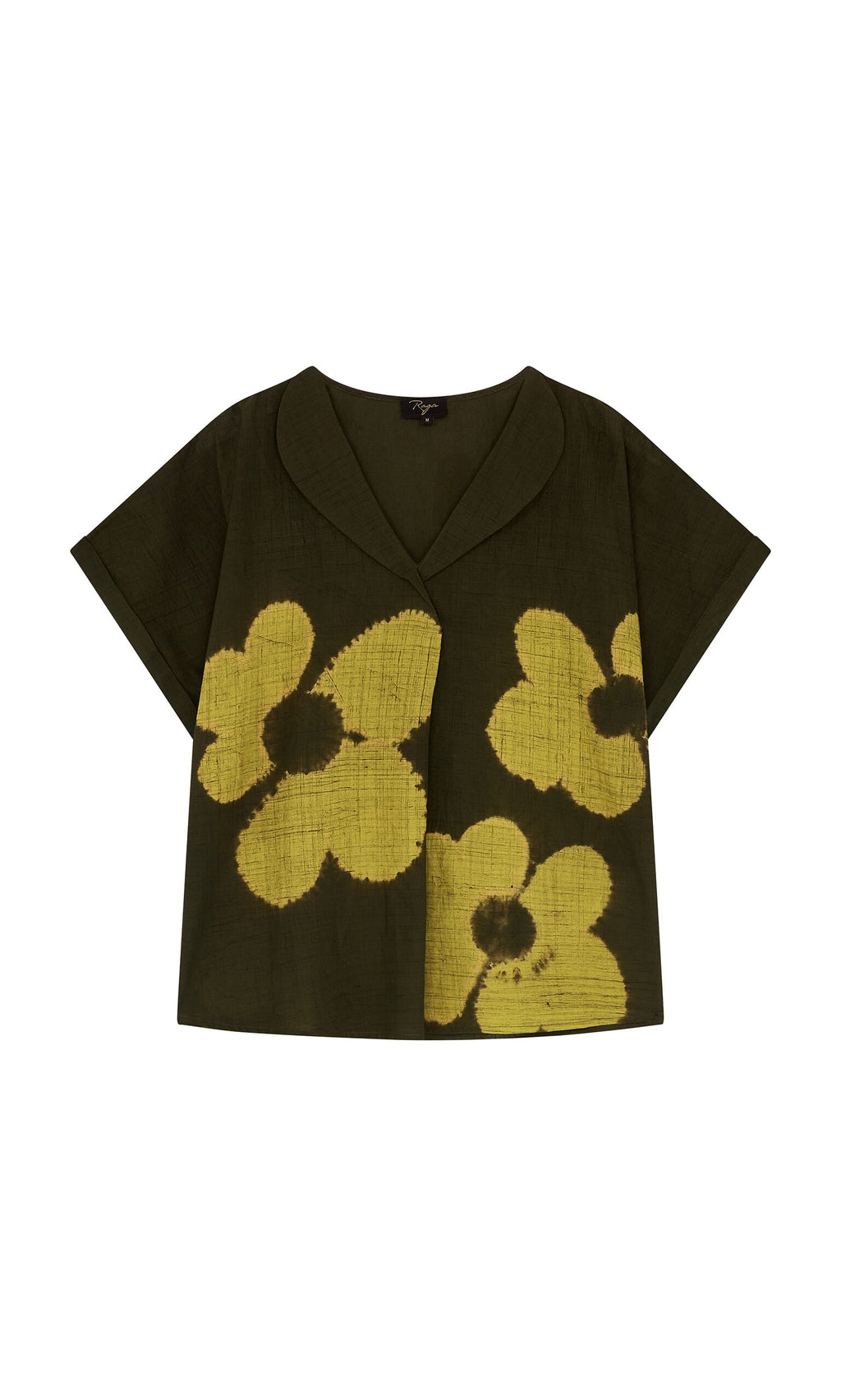 Plümo- The Orta Blouse is a dark green Cuban-style shirt with a collar and bold yellow floral pattern on the front.