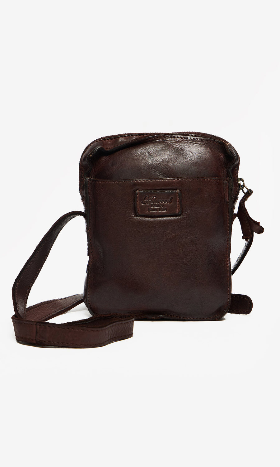 Plümo- Orton Parcel Bag: small dark brown leather pouch with front pocket and adjustable strap, shown on white background.