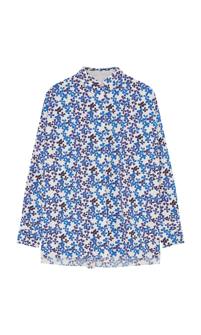 Plümo- Osterley Shirt: long-sleeved, papery cotton with blue and violet-blue pansy floral print on white.