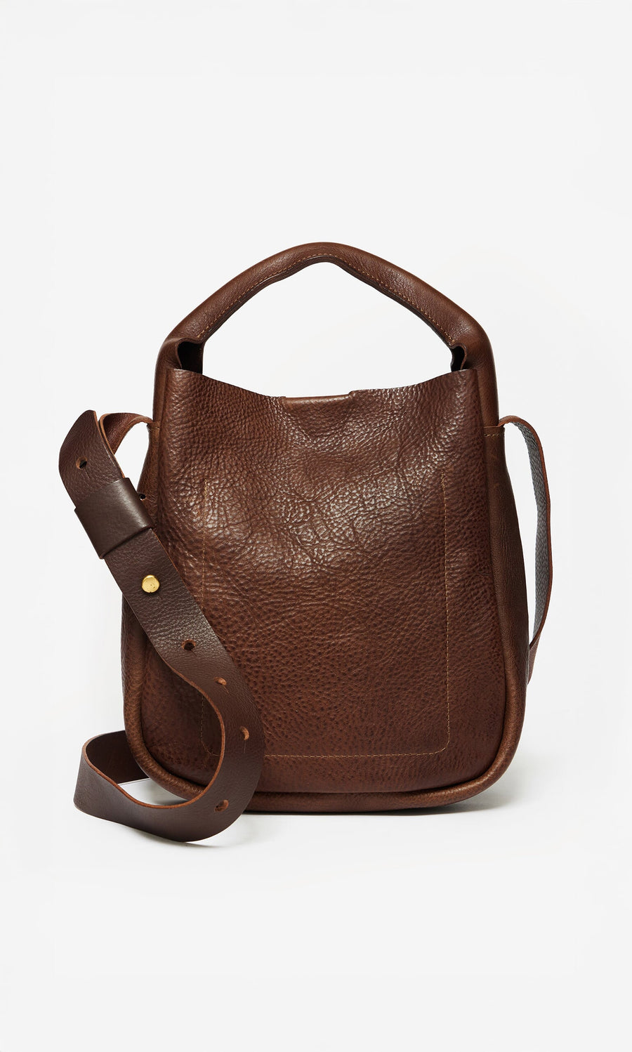 Plümo- Otto Leather Bag in dark brown grainy leather with a short handle and wide adjustable crossbody strap on white background.
