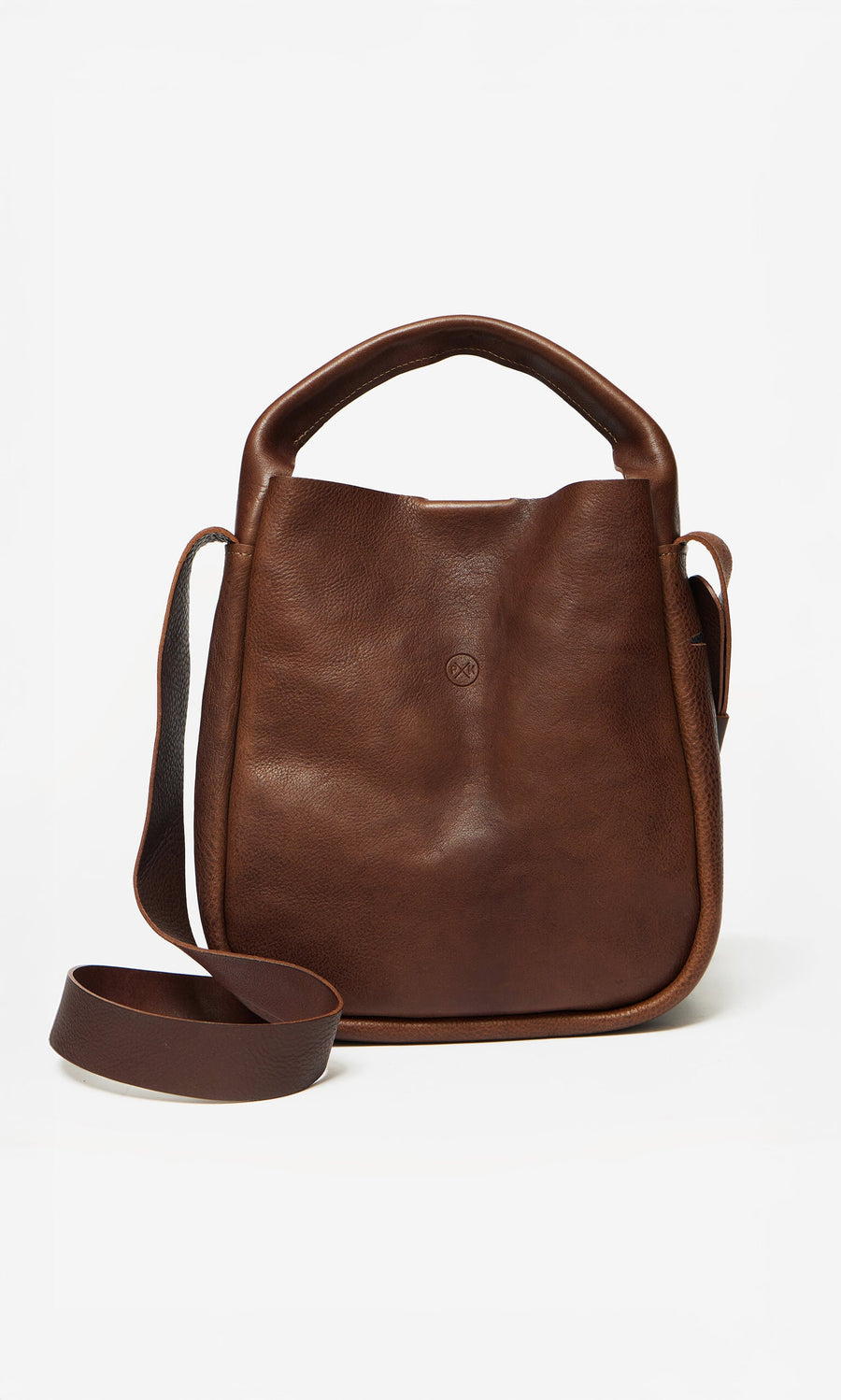 Plümo- Otto Leather Bag in brown grainy leather with top handle, embossed logo, and adjustable crossbody strap on white background.
