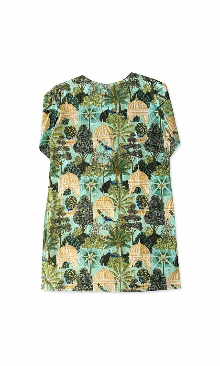 Plümo- Peacock Tunic: Short-sleeve white tunic with green, beige, and black tropical prints and a v-neckline.