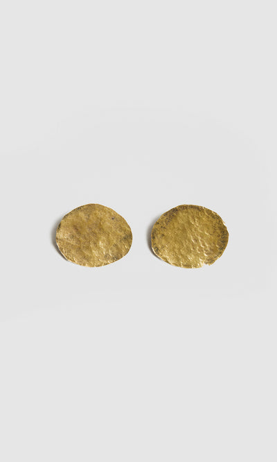 Plümo  Two round, textured Cohen Earrings in recycled brass capture the unique handmade jewellery style of Cornwall.