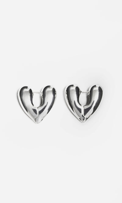 Plümo  Silver Heart Earrings made from recycled sterling silver displayed on a plain white background.