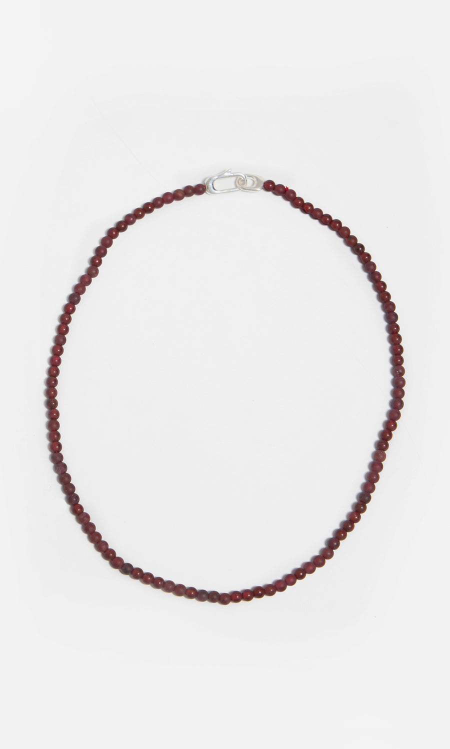 Plümo  The Rowena Necklace features small round red jasper beads and a sterling silver clasp in a single-strand design.