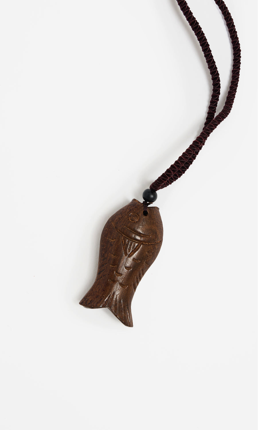 Plümo  Yumi Fish Necklace: brown wood pendant on adjustable cord, lightweight, shown on white background.