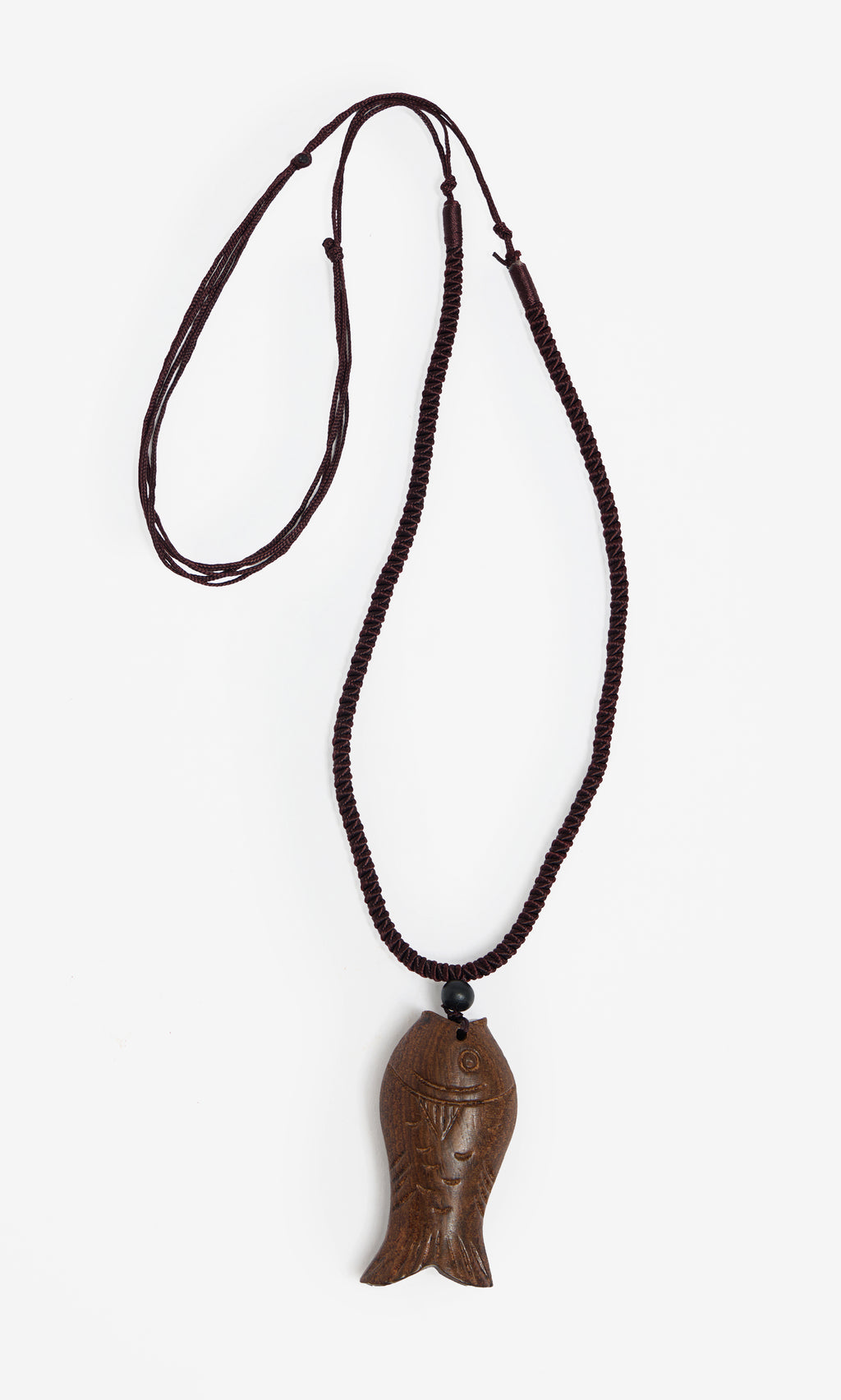 Plümo  Yumi Fish Necklace: Lightweight wooden pendant on adjustable cord, shown against a plain white background.