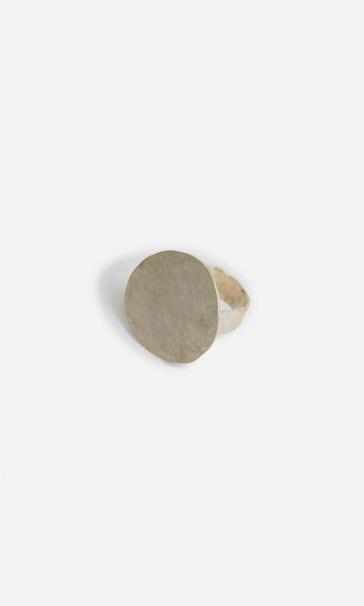 Plümo  Eco Silver Pebble Ring featuring a large, flat oval face, displayed on a simple white background.